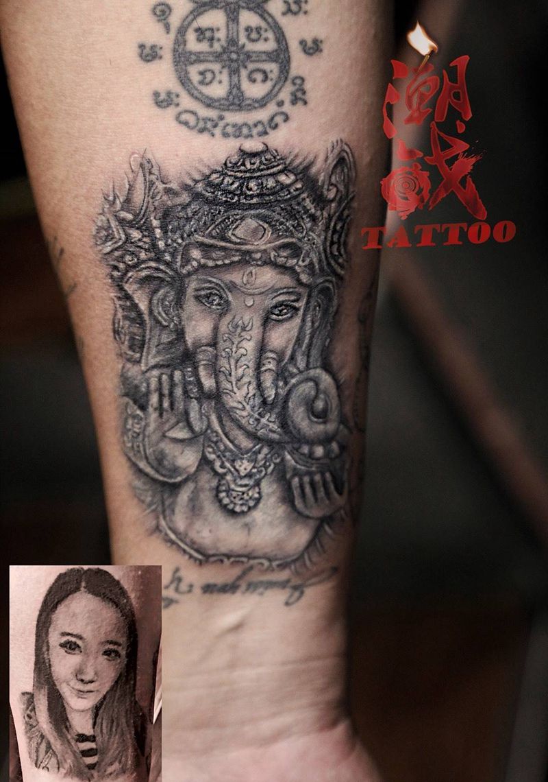 肖像遮盖纹身图片_手臂新传统遮盖象神纹身图案