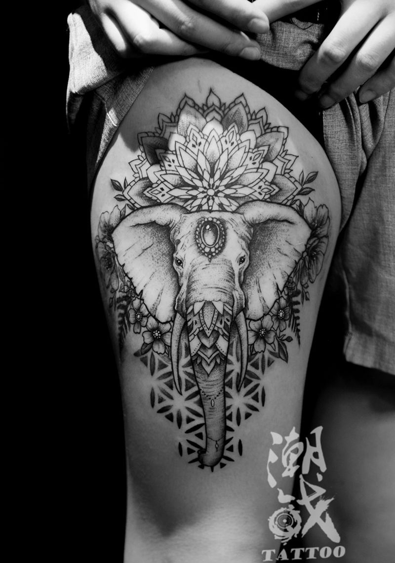 象纹身图片_腿部点刺几何纹身图案