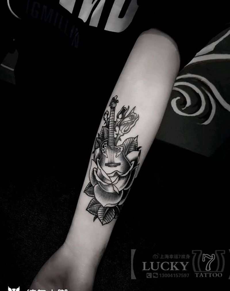 吉他|幸运7纹身纹身图片_手臂欧美成品纹身图案
