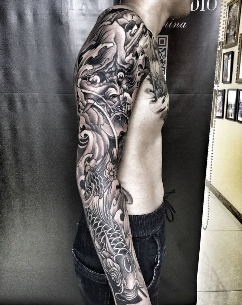 班若鲤鱼花臂纹身图片