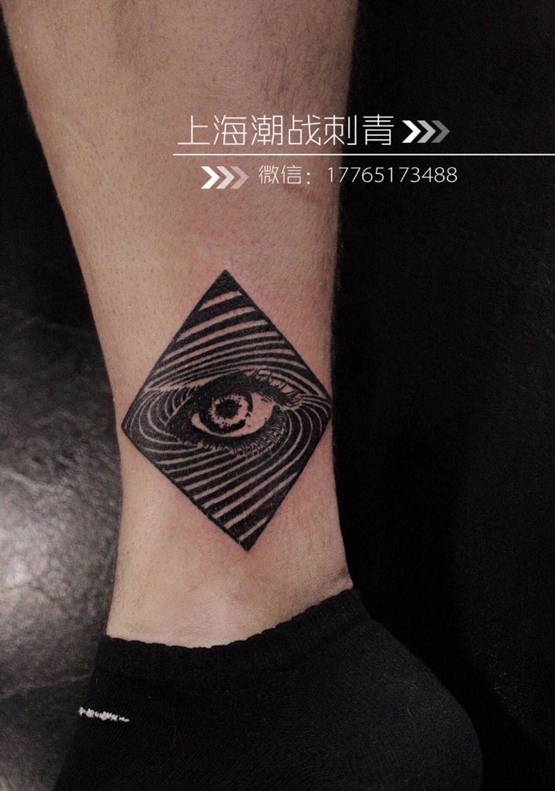漩涡之眼纹身图片_成品腿部欧美原创几何纹身图案