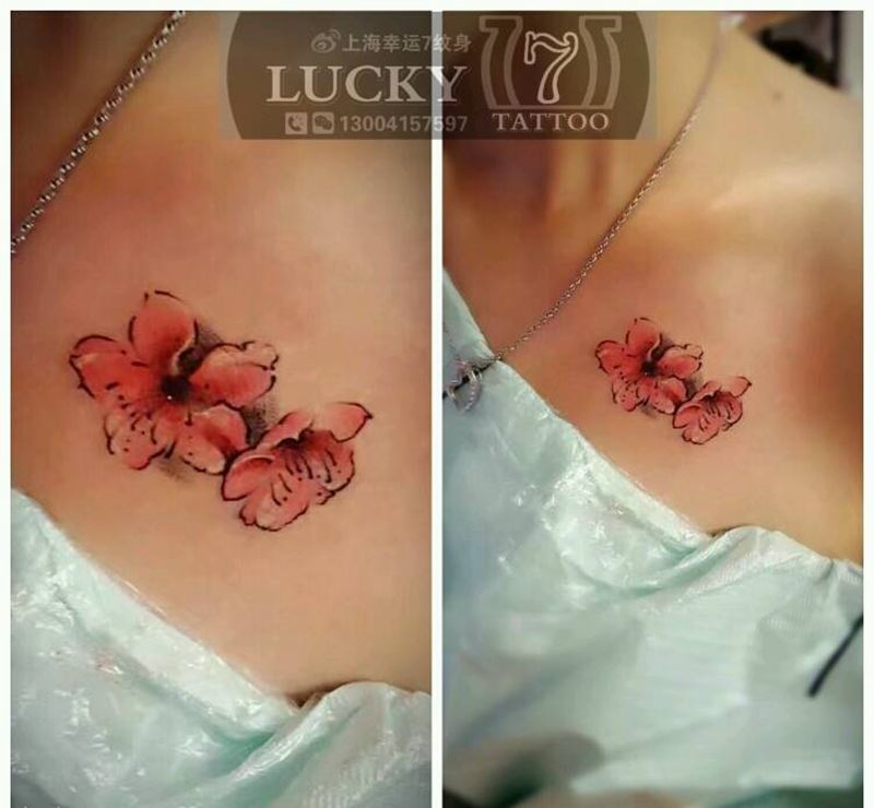 小花|幸运7纹身纹身图片_肩部清新植物原创彩色水墨成品纹身图案