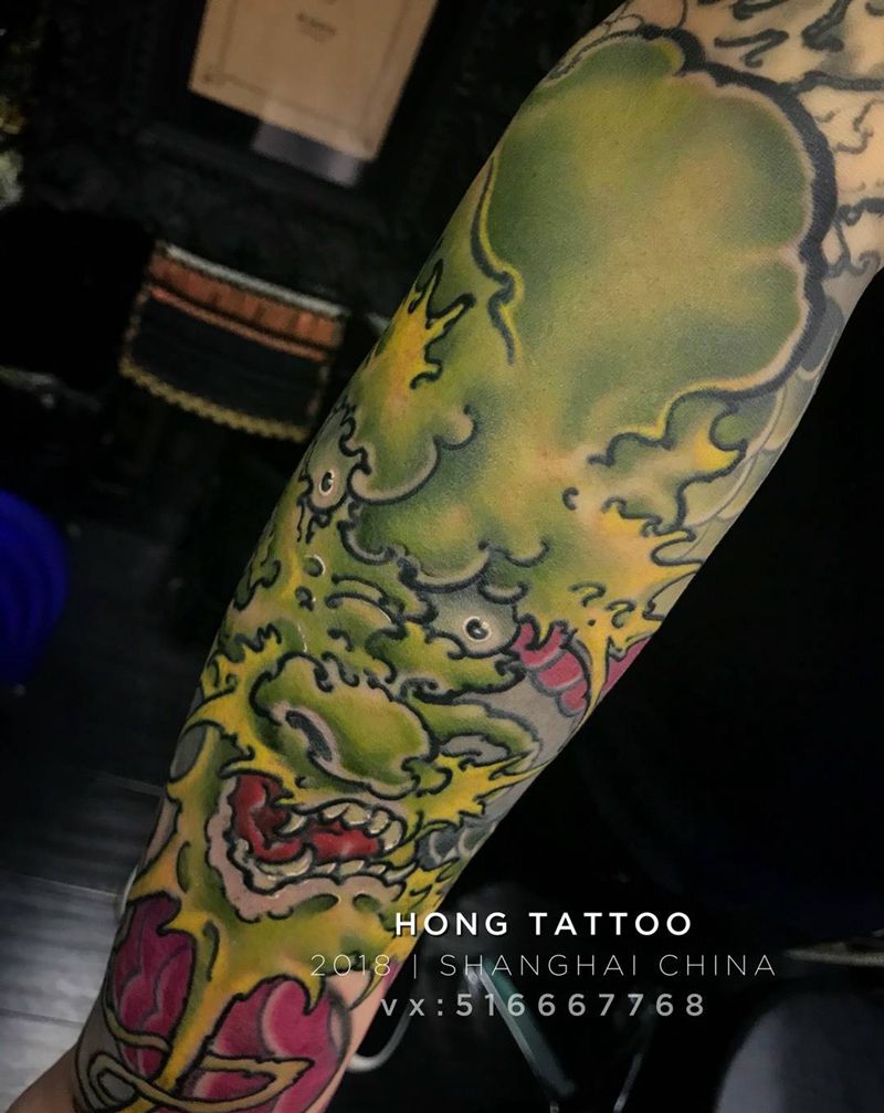 龙臂局部未完纹身图片