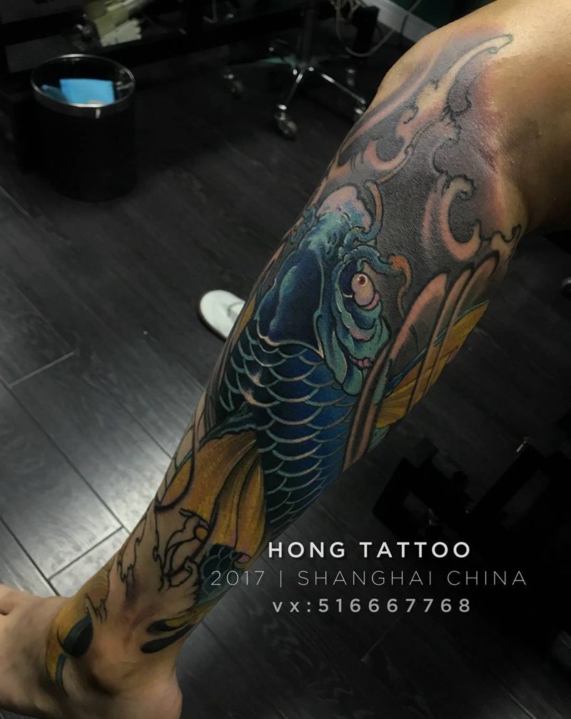 小腿鲤鱼纹身图片