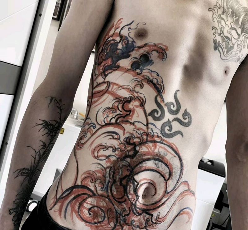 浪花遮盖 未完纹身图片_腹部老传统纹身图案
