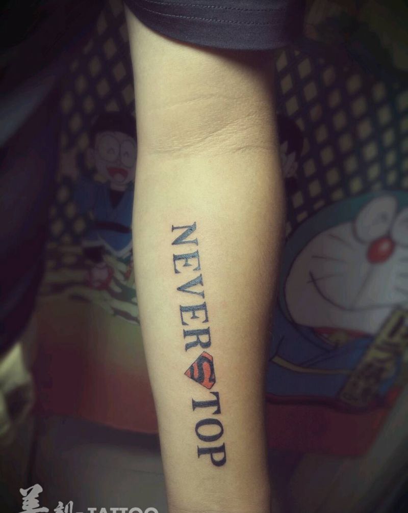 永不放弃！纹身图片_手臂欧美字符成品纹身图案