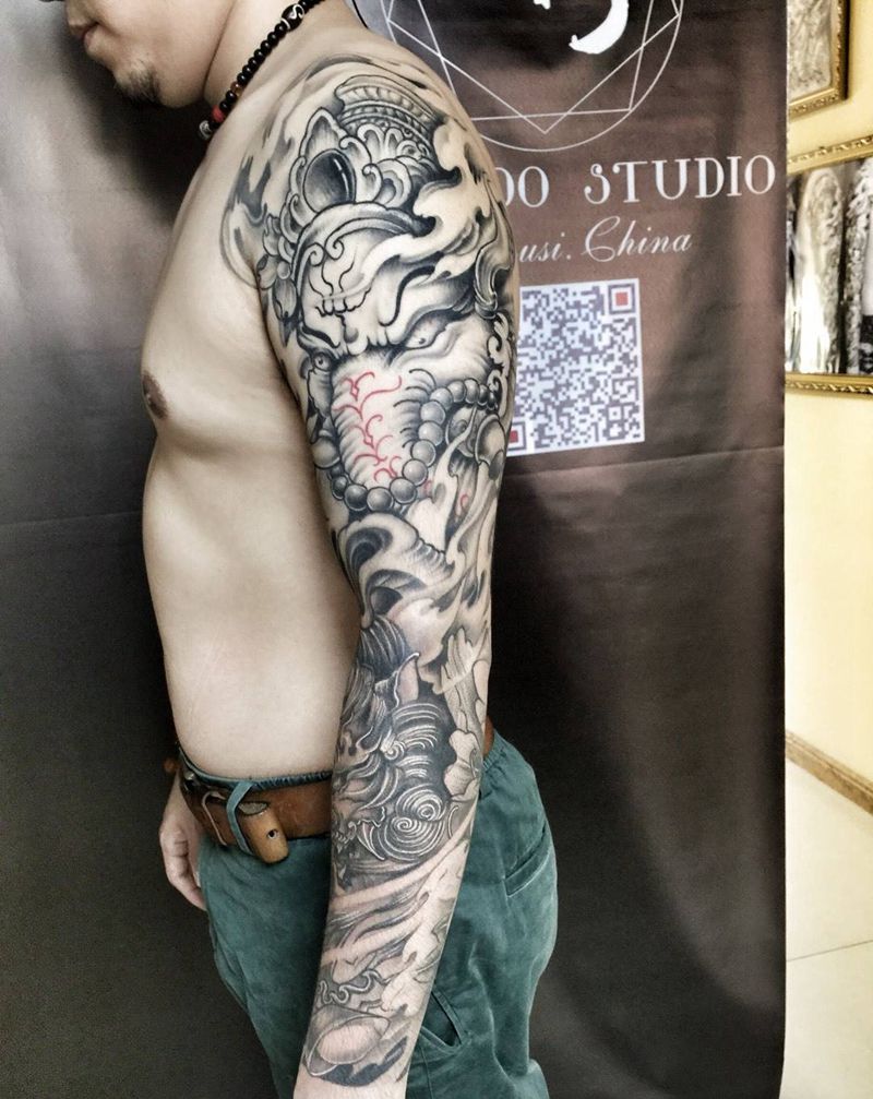 象神唐狮子花臂纹身图片