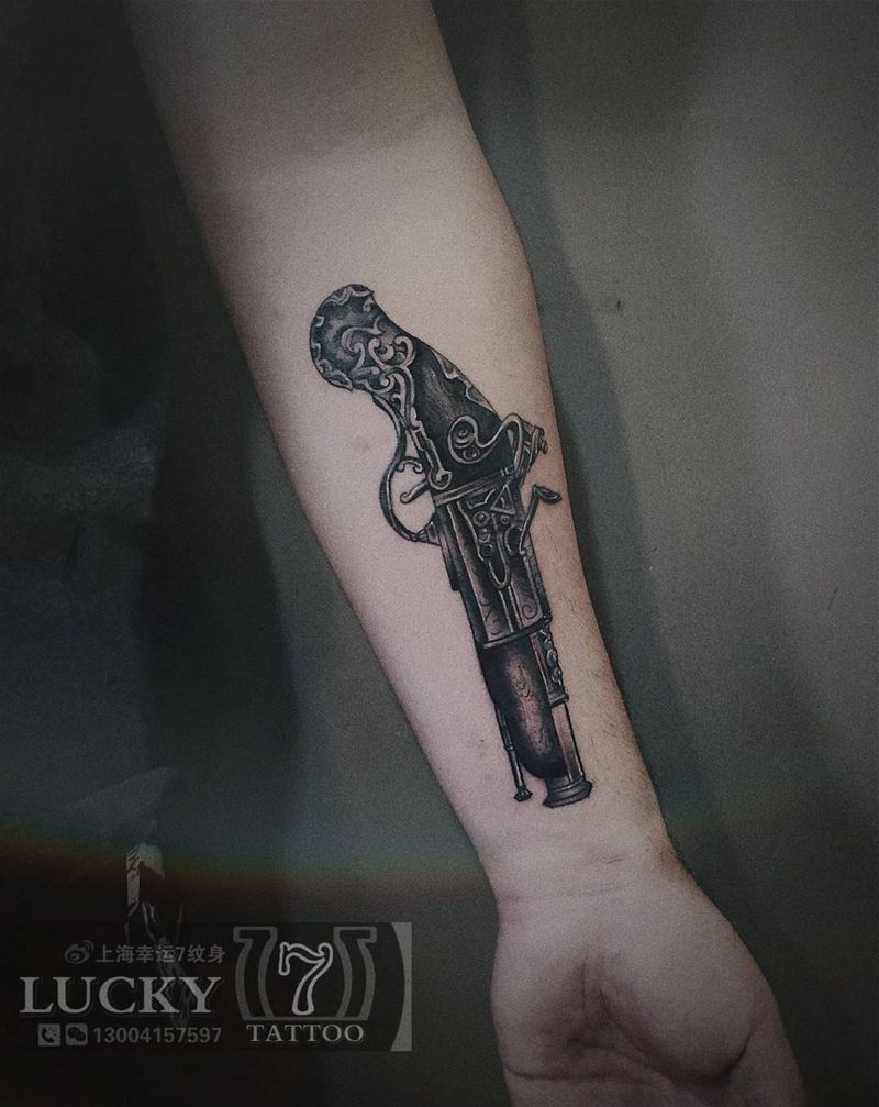 火枪|幸运7纹身纹身图片_欧美写实小臂纹身图案