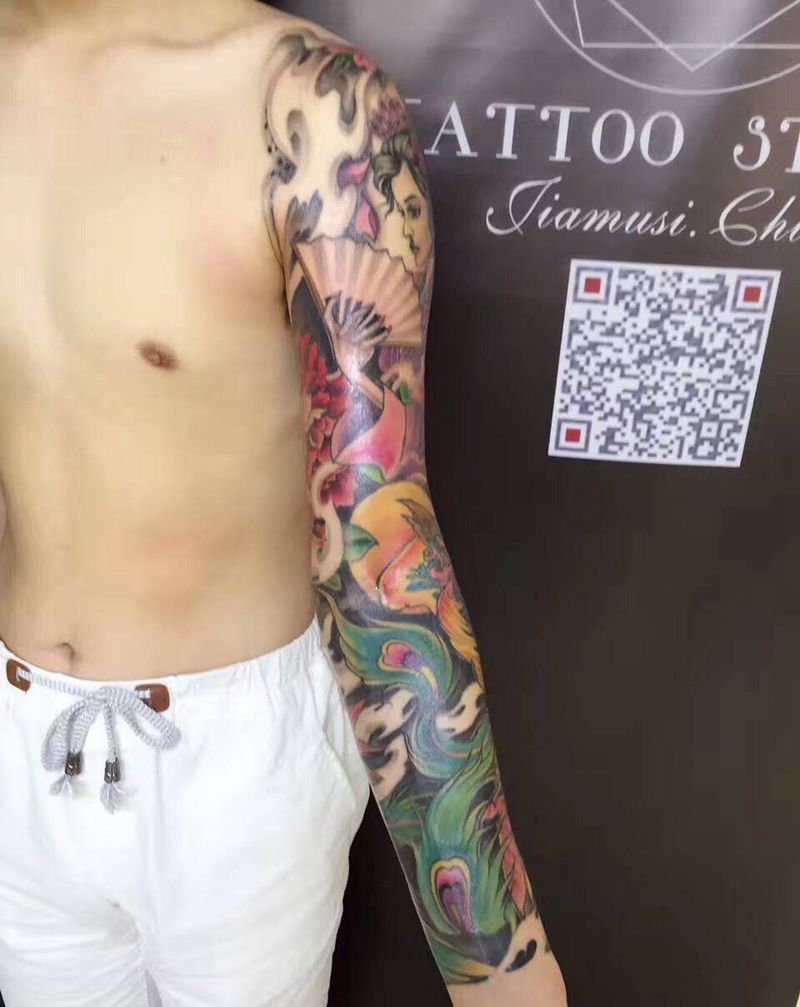 凤凰花臂纹身图片