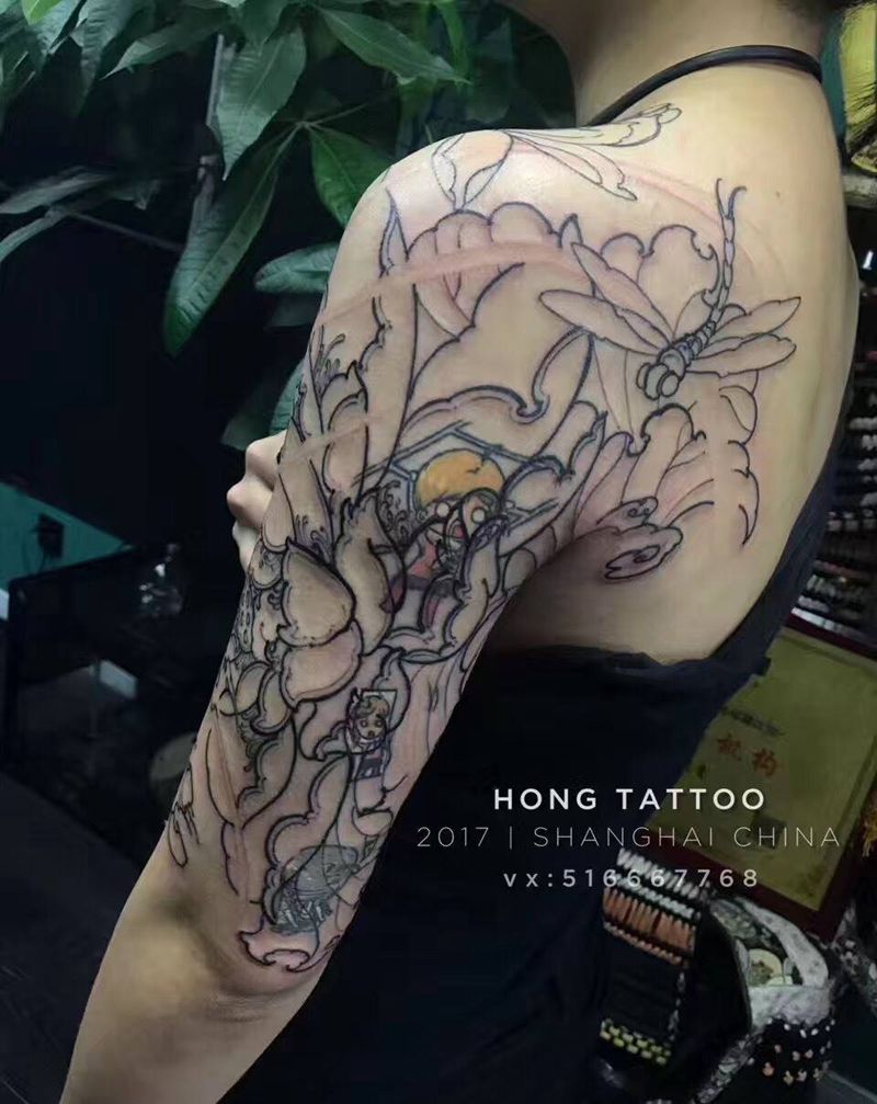 荷花遮盖纹身图片
