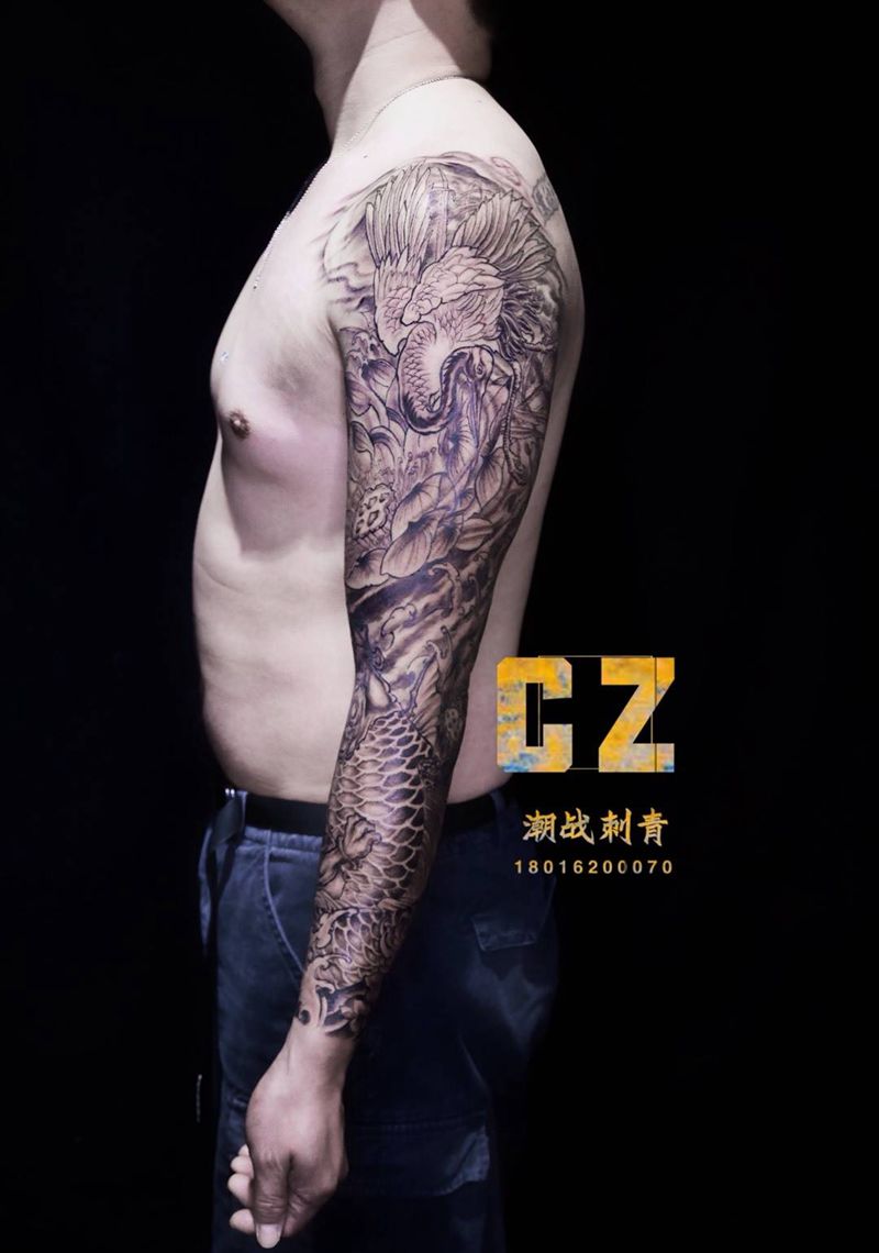 风生水起纹身图片_手臂新传统鲤鱼仙鹤纹身图案