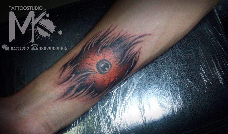 恶魔之眼纹身图片_手臂欧美写实纹身图案
