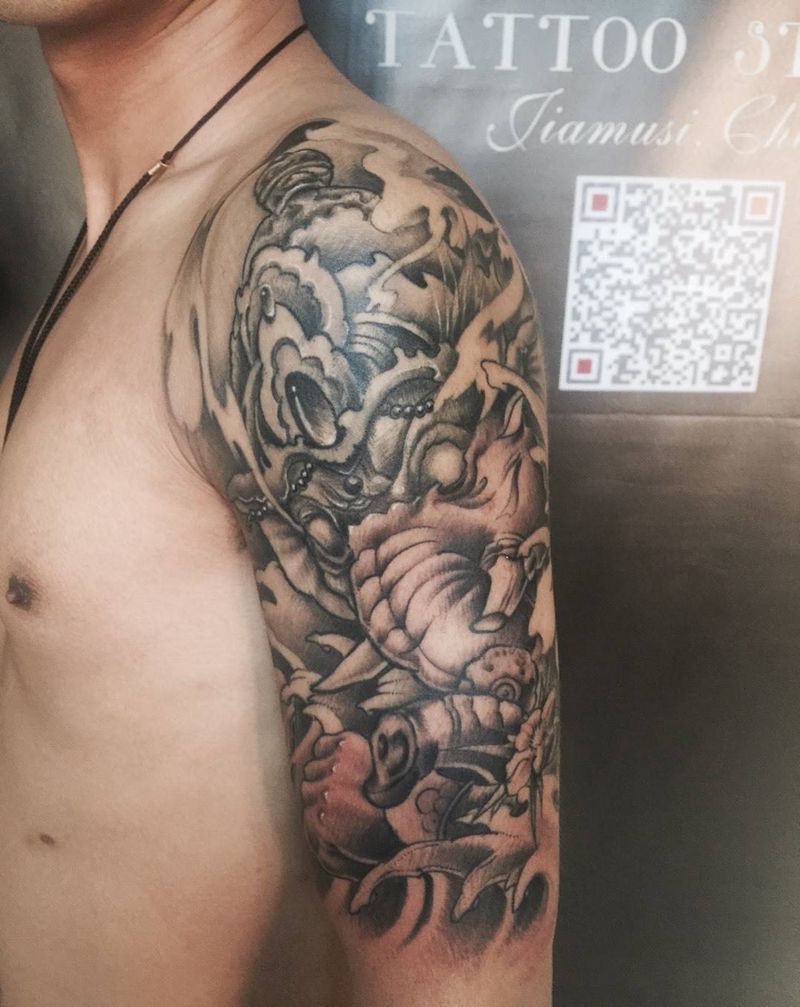 遮盖，象财神包大臂纹身图片