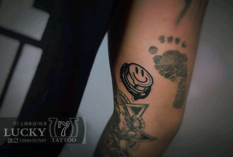 笑脸按钮|图腾|幸运7纹身纹身图片_手臂图腾纹身图案