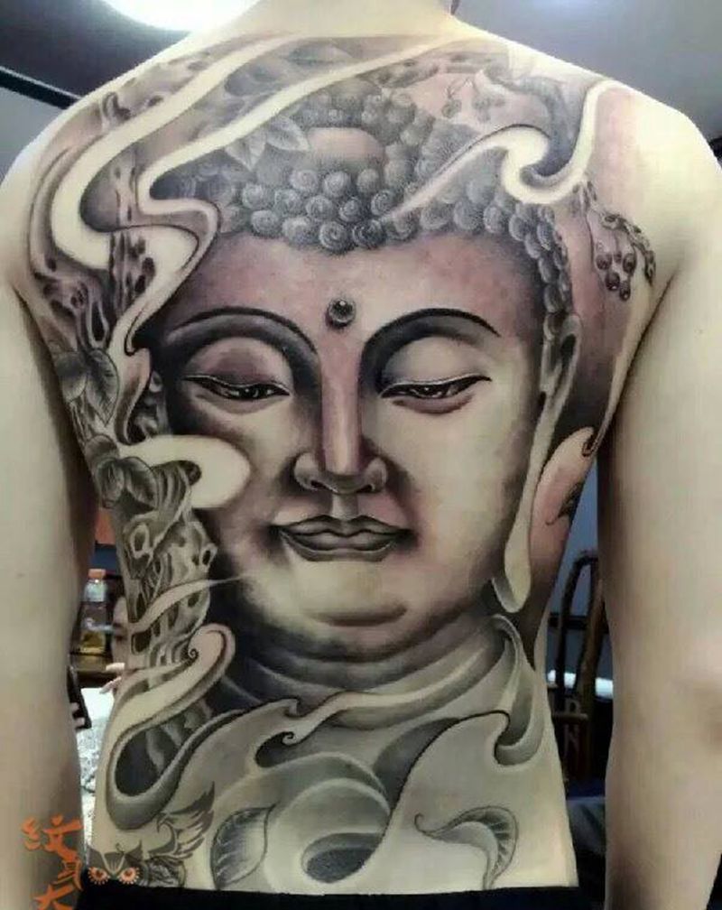 佛头纹身图片_成品背部传统人物纹身图案