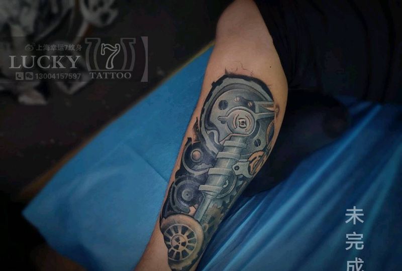 机械|幸运7纹身纹身图片_欧美写实小腿未完成纹身图案