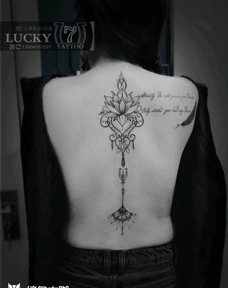梵花图腾|幸运7纹身纹身图片_背部点刺图腾脊椎纹身图案