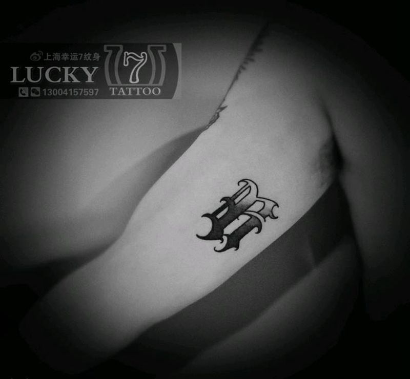 字母|幸运7纹身纹身图片_手臂花体字纹身图案