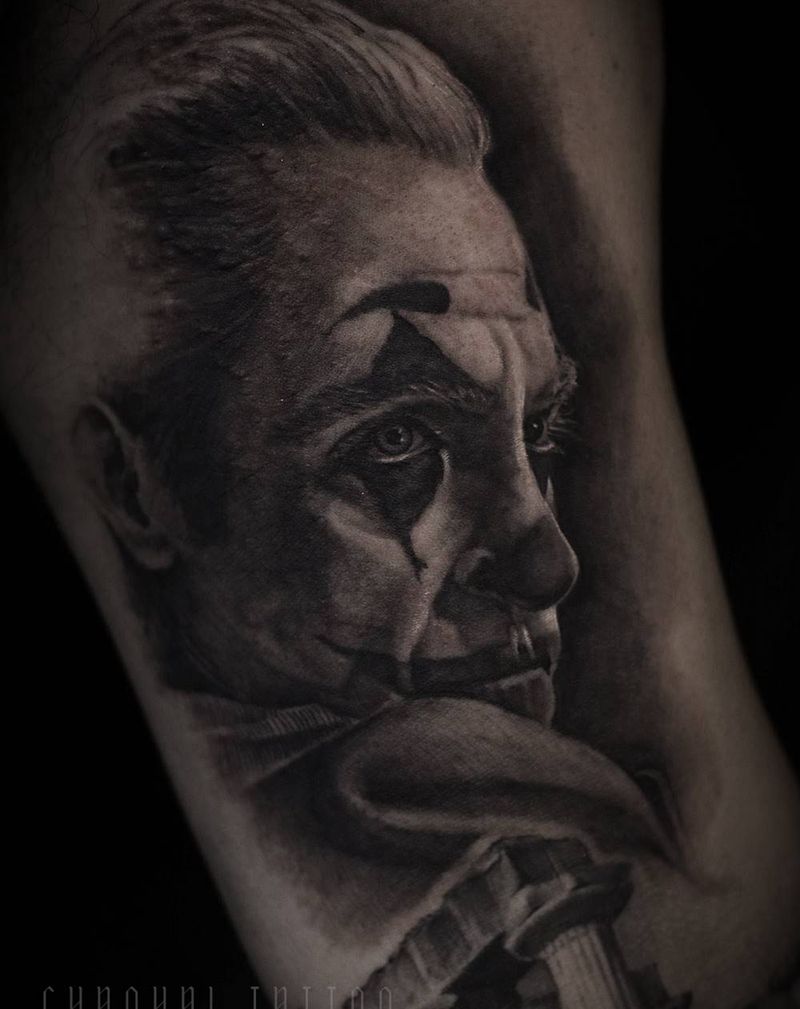 小丑纹身图片_手臂欧美写实纹身图案