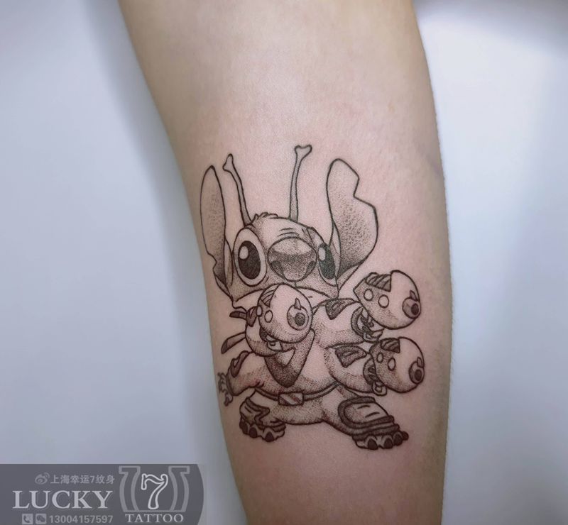 史迪仔|幸运7纹身纹身图片_手臂点刺卡通纹身图案
