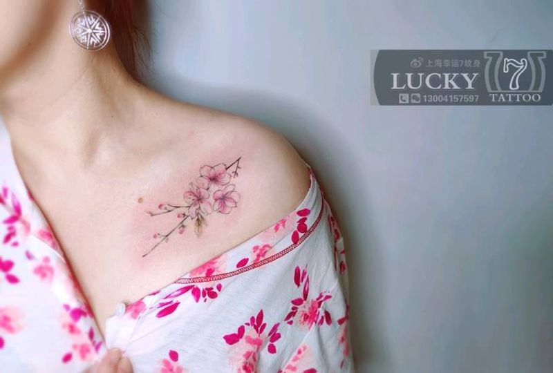 樱花|幸运7纹身纹身图片_水彩锁骨清新纹身图案