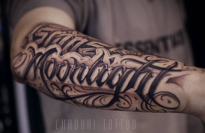 花体字纹身图片_手臂花体字纹身图案