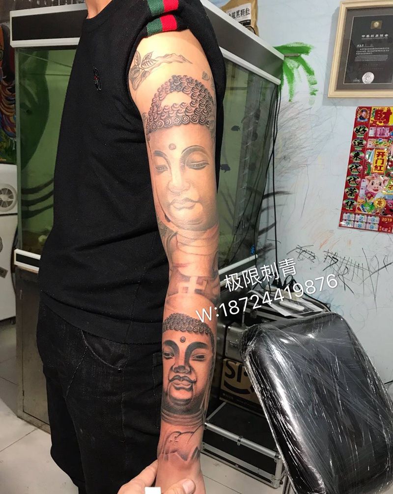 花臂佛纹身图片_手臂纹身图案