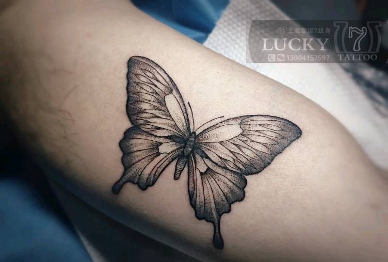 点刺蝴蝶|幸运7纹身纹身图片_手臂点刺纹身图案