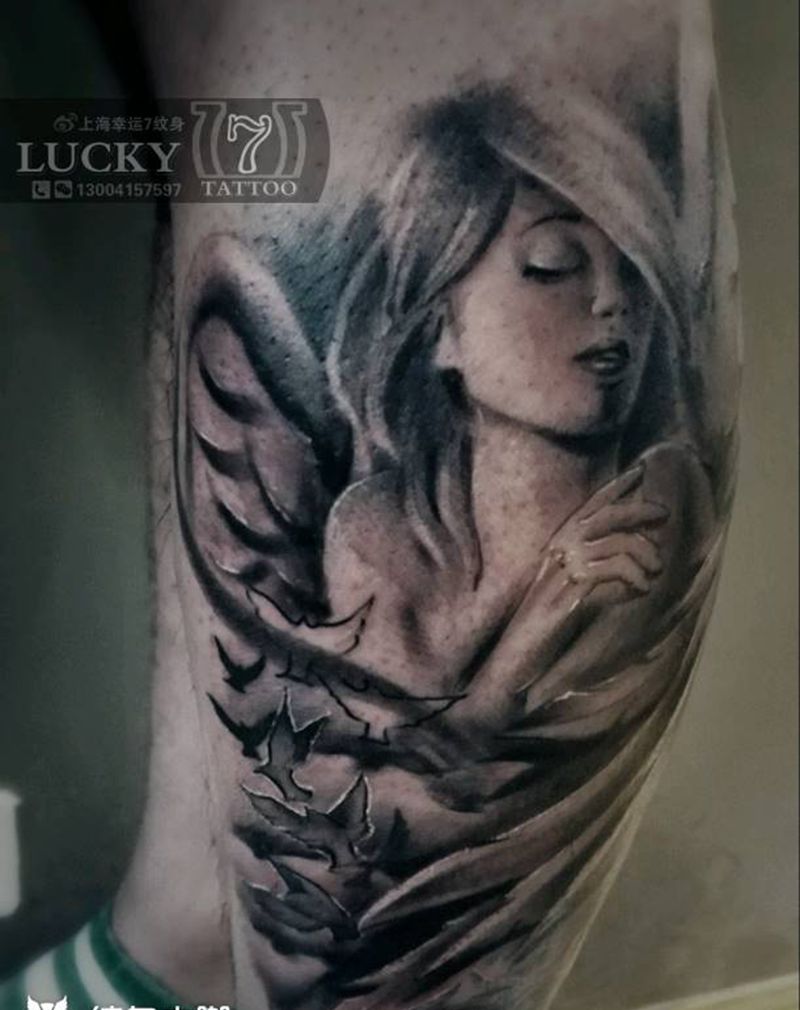 欧美|天使|玫瑰|幸运7纹身纹身图片_腿部欧美人物黑灰成品纹身图案