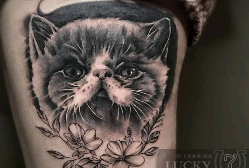 写实猫头|幸运7纹身纹身图片_欧美写实大腿纹身图案