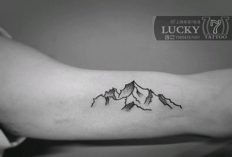 点刺小山峰|幸运7纹身纹身图片_手臂点刺纹身图案