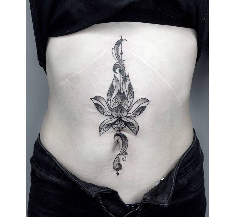 疤痕遮盖纹身图片_成品腹部清新植物几何遮盖莲花纹身图案