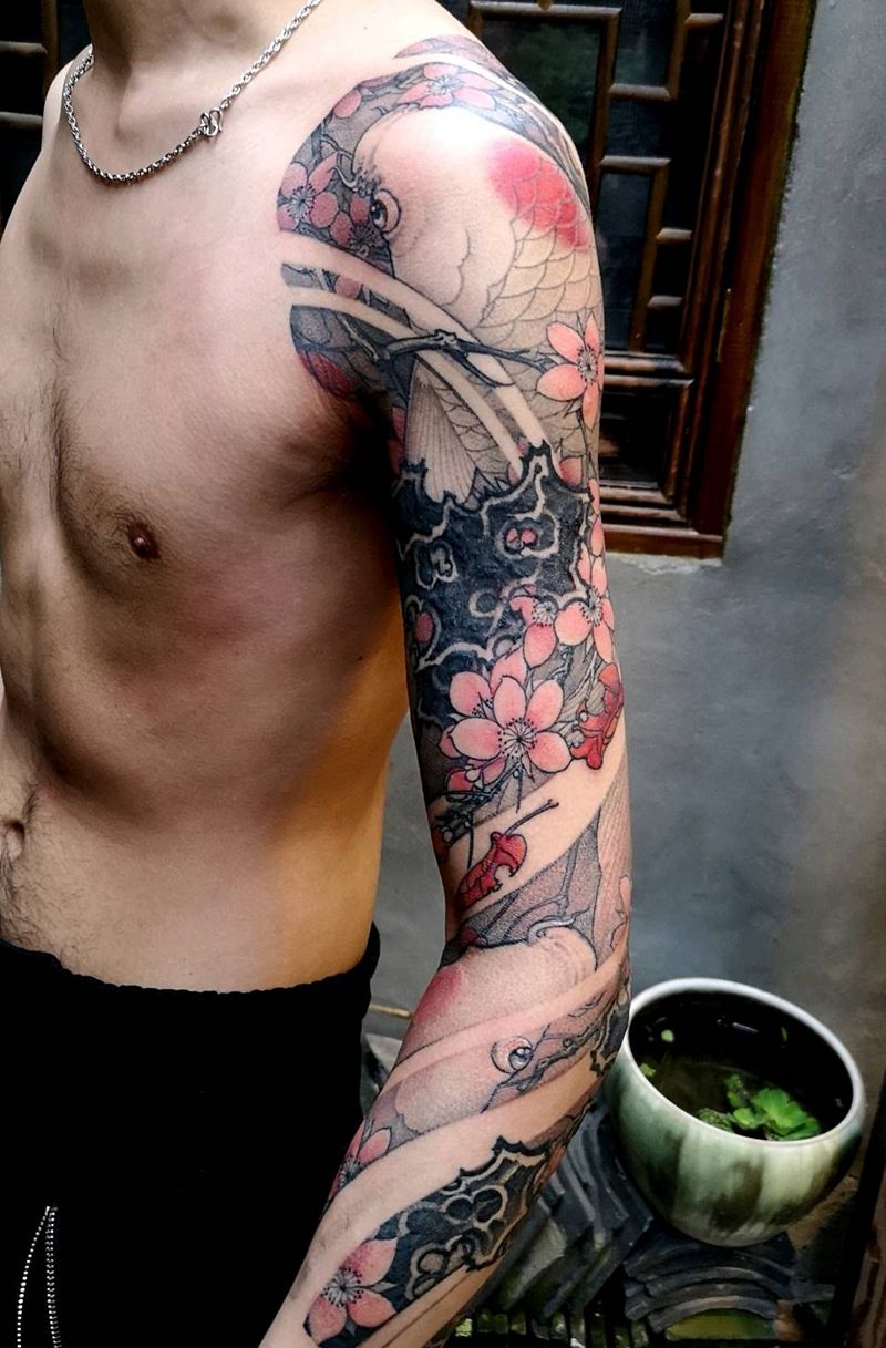 自由自在纹身图片_手臂老传统汉刺青中国风锦鲤纹身图案