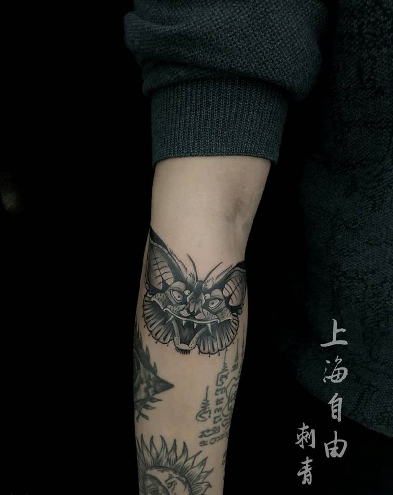 蝴蝶纹身图片_手臂欧美写实New School蝴蝶纹身图案