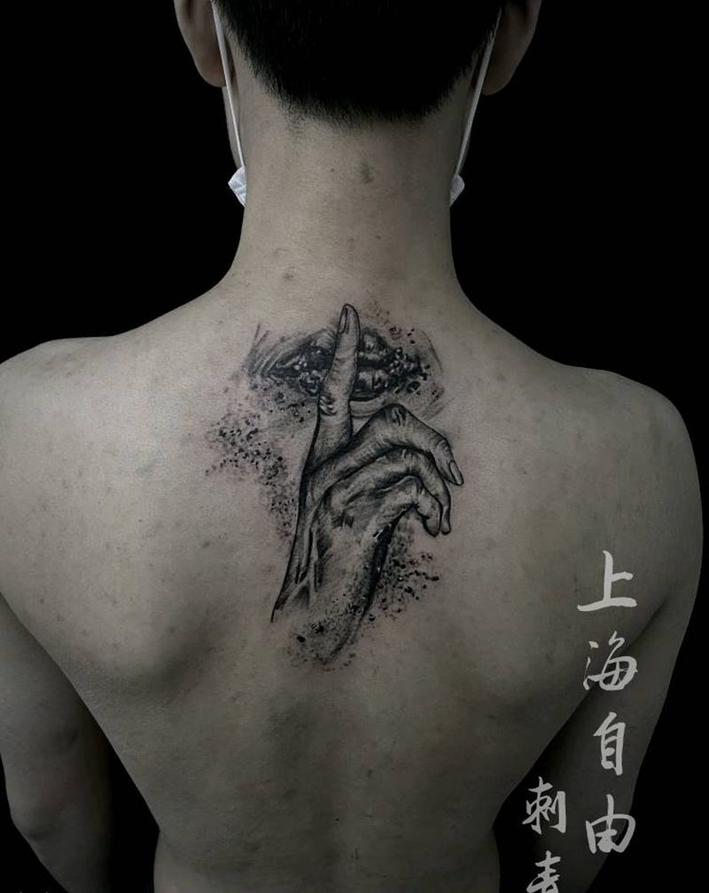 嘘纹身图片_手臂手嘴纹身图案