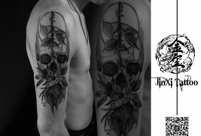 大臂骷髅头纹身图片