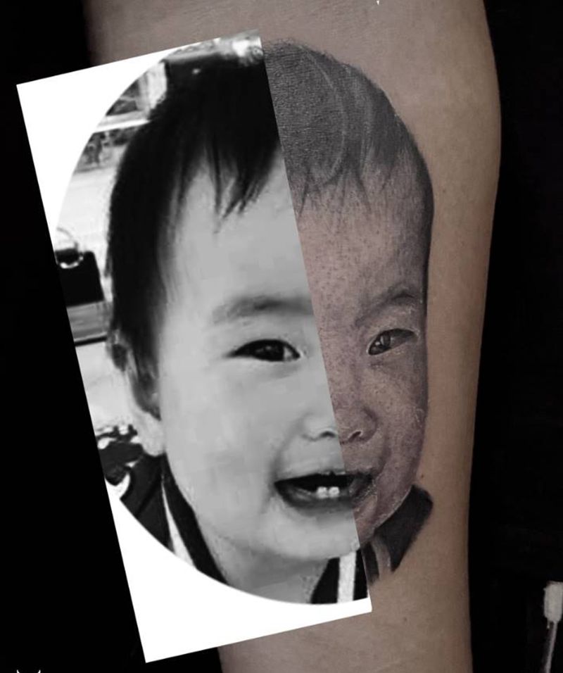 孩子纹身图片_手臂欧美写实肖像纹身图案