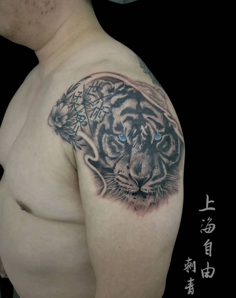 虎纹身图片_手臂肩部欧美写实虎纹身图案