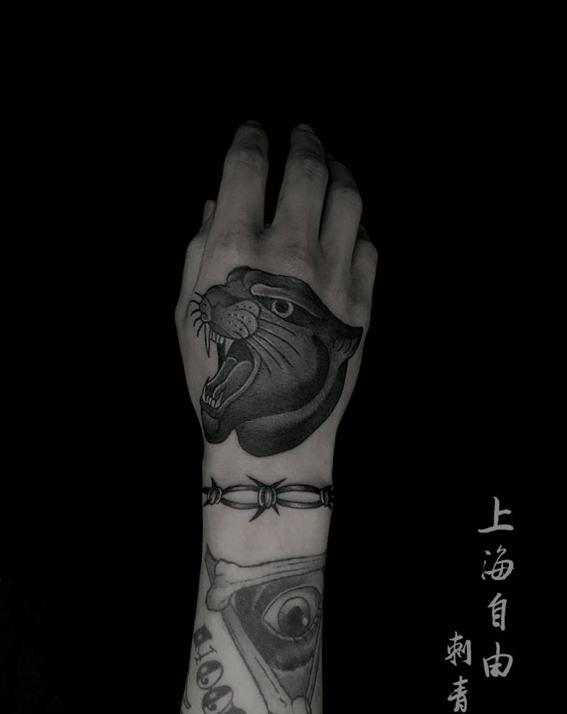 豹豹豹子纹身图片_手部Old School纹身图案