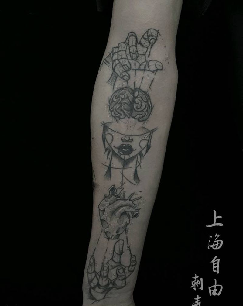 操控纹身图片_手臂纹身图案