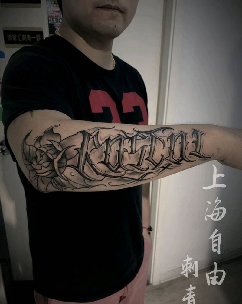 痞子纹身图片_手臂花体字手臂外侧纹身图案