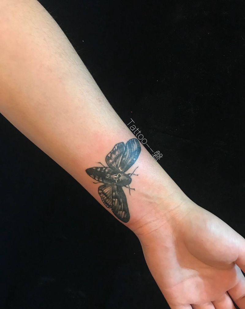 沉默的羔羊纹身图片_肩部欧美写实纹身图案