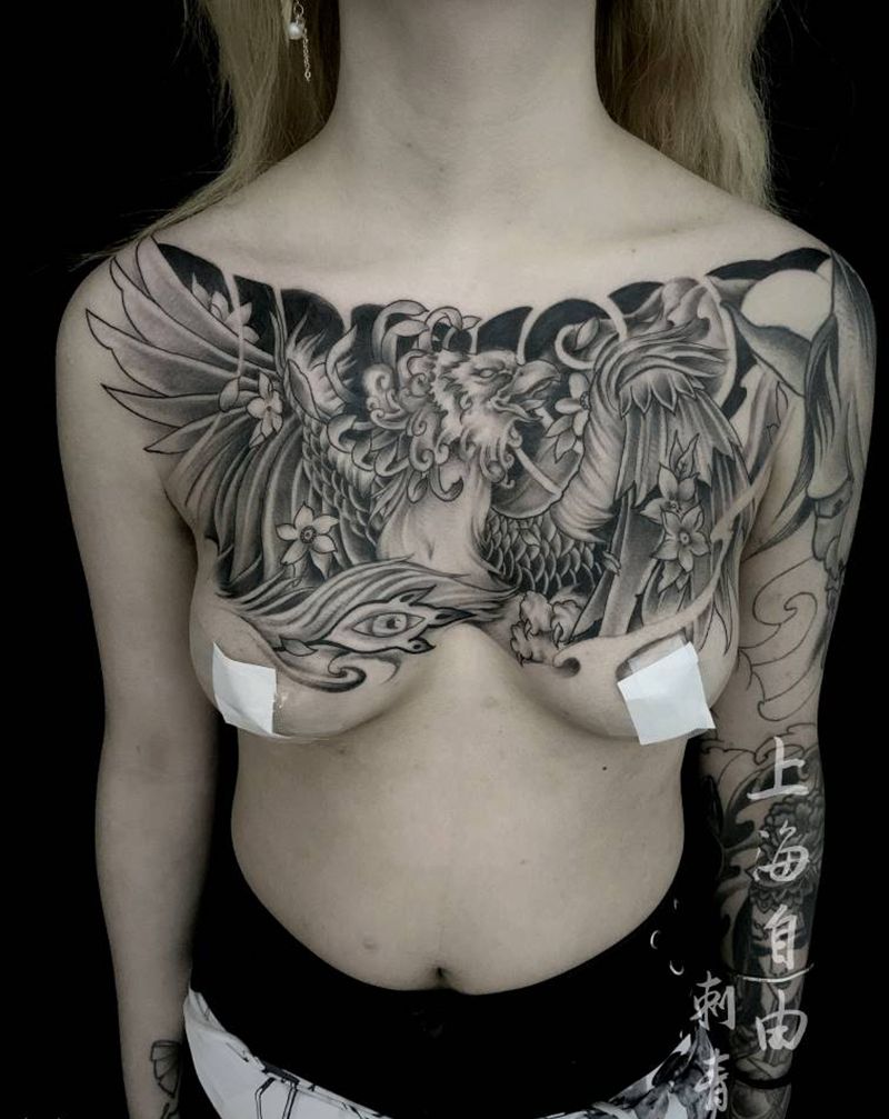 凤凰纹身图片_胸部新传统凤凰凤凰花胸花胸纹身图案