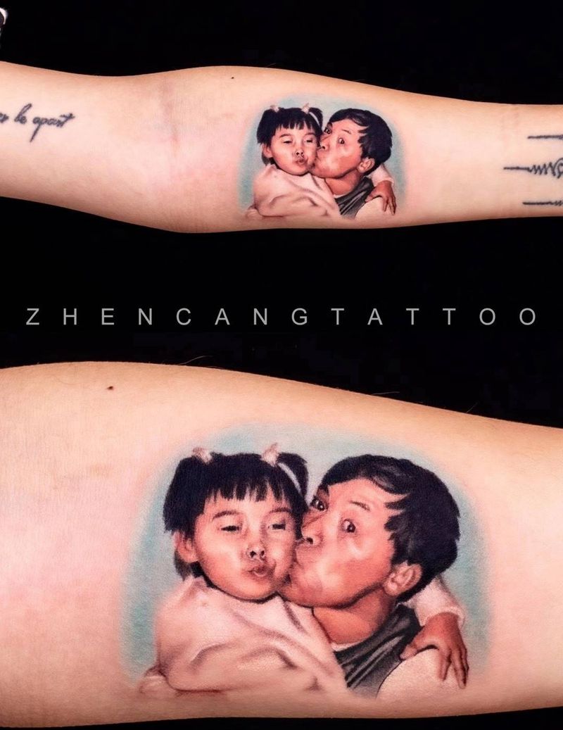 家人 针藏刺青 邵钢老师纹身图片_手臂肖像邵钢写实纹身图案