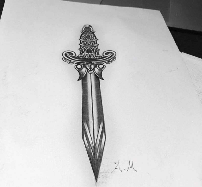 匕首纹身图片_手稿腹部欧美几何纹身图案