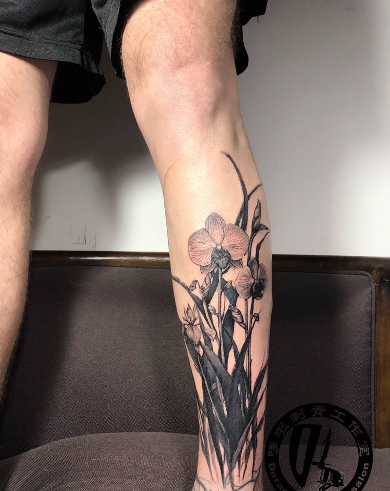 扎根纹身图片_腿部欧美写实水墨原创纹身图案