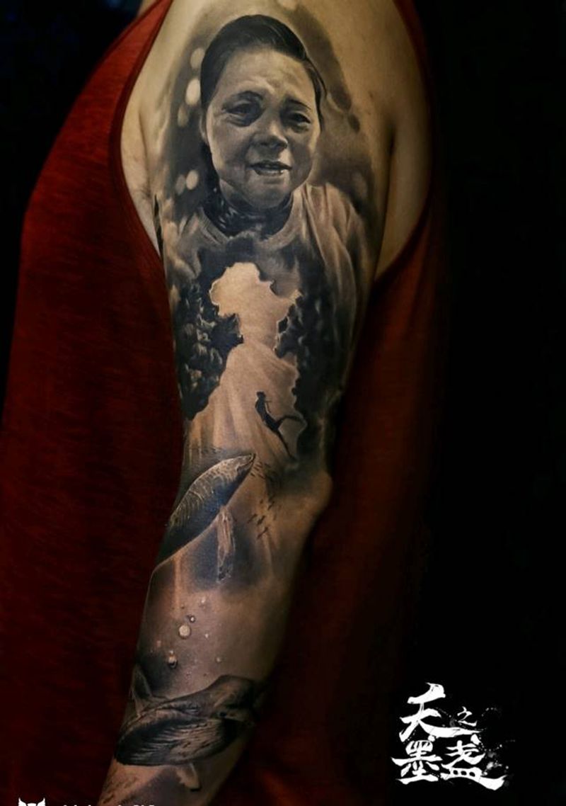 亲情主题花臂纹身图片_手臂欧美写实大翅鲸纹身图案