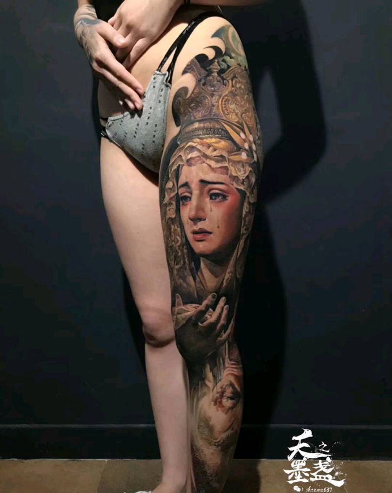 彩色写实花腿纹身图片_腿部欧美写实圣母像纹身图案