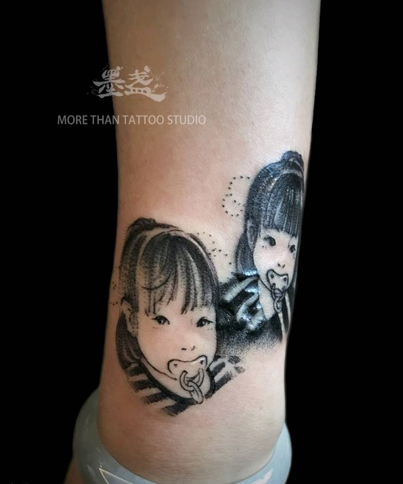 双胞胎肖像纹身图片_手臂简笔画纹身图案