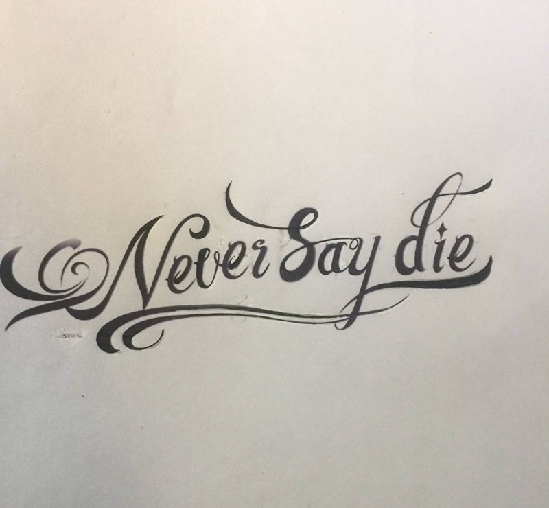 Never say die纹身图片